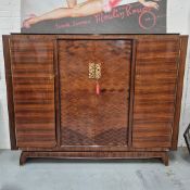 ATTRIBUTED TO ANDRE BOYER BEDROOM CABINET.