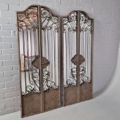 PAIR OF GARDEN GATE WALL MIRRORS.