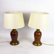 PAIR OF MID 20th CENTURY ITALIAN WALNUT AND BRASS TABLE LAMPS.