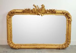 A RECTANGULAR GILT FRAMED WALL MIRROR.