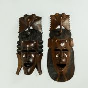A PAIR OF AFRICAN WALL MASKS.