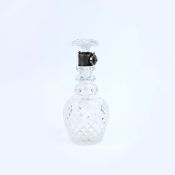 AN EARLY 20TH CENTURY CUT GLASS COMMEORATIVE SILVER CAPPED DECANTER.