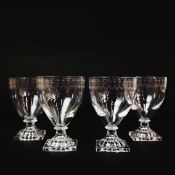 A SET OF FOUR GEORGIAN LEMON-SQUEEZER FOOTED RUMMERS (4).