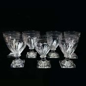 A SET OF SEVEN GEORGIAN LEMON-SQUEEZER FOOTED RUMMERS (7).