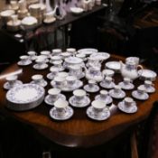 A ROYAL DOULTON 'SAPPHIRE BLOSSOM' DINNER SERVICE. (QTY).