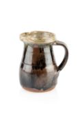 Richard Batterham (1936-2021) Jug the body decorated with a brown glaze unmarked 14cm high. Small