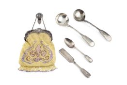 A late Victorian silver mounted beadwork purse, with pierced and foliate scroll mounts and