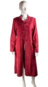 A JEAN MUIR, 1990’s, long, crimson red suede coat with matching buttons and side pockets. Lined,