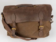 A Barbour travel bag with shoulder strap, Barbour classic lining, and internal pockets, together