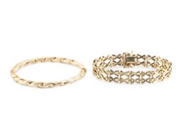 A yellow precious metal fancy-link bracelet, stamped '375', together with a twisted bangle, of