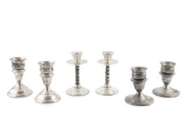 A pair of American silver dwarf candlesticks, with pierced detachable nozzles, and gadrooned