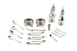 A collection of silver, comprising two octagonal baluster sugar castors, a pair of Georgian circular