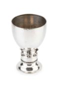 A Danish silver chalice, of Arts and Crafts design, the planished body on domed and beaded spreading