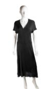 A JEAN MUIR, 1980’s, long black dress with V-neck and short sleeves (UK 14); A pair of trousers with