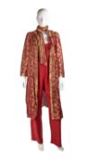 A Caroline Charles, London outfit with a Middle Eastern-inspired design in red silk, the coat with