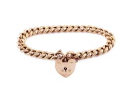 A curb-link bracelet, of hollow part-textured design, with padlock clasp, stamped '9CT', length 19cm