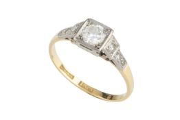 A diamond single stone ring, the round brilliant-cut diamond in square millegrained setting, between