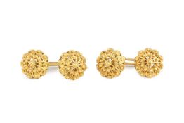 A pair of cufflinks, of filigree design with beaded accents, on baton fittings, indistinctly marked,