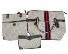Two GUCCI 1980's travel bags, together with a matching toiletries bag all in GG monogram canvas, the