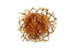 A geode panel brooch, with textured abstract surround, 9ct gold mounted, hallmarked for Birmingham