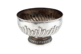 A late Victorian silver punch bowl, having spirally lobed body and pedestal foot, maker's mark