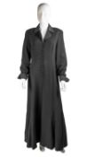 A Caroline Charles, London long black dress with satin collar and cuffs, and a central strip of
