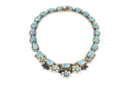 A costume necklace by Christian Dior, designed as a graduated collar of blue stone and imitation