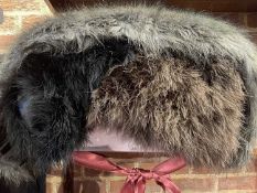 A selection of faux fur and feather shawls in colours of browns and blacks (4)