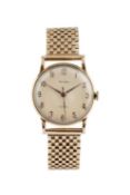 A bracelet watch, the circular cream dial with gilt Arabic numerals, centre seconds hand and outer