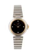 A stainless steel bracelet watch by Dunhill, the circular black dial with diamond set quarters, to a