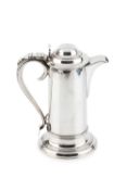 A mid-19th century silver plated tankard, of cylindrical form with hinged domed cover and scroll