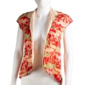 An Annabelinda Oxford, Liberty & Co short-sleeved jacket in colours of red, pale pink and green