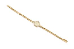 A diamond set cocktail watch by Bucherer, the signed lozenge-shaped dial with gilt tapered hands, to