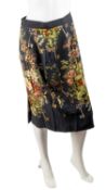 A selection of DOLCE & GABBANA, 2010, garments to include: A black and floral pencil skirt, silk,