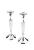A pair of American silver candlesticks, with knopped stems and weighted bases, stamped sterling,