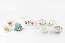 A collection of ceramics, to include a Meissen tea bowl painted with flowers, a New Hall tea bowl,