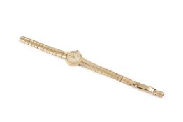 A 9ct gold lady's bracelet watch, the circular cream dial signed Smiths, with stylised numeral 12