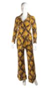 A BIBA matching jacket and trousers in colours of mustard, brown and black in striking geometric