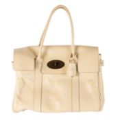 A Mulberry, Bayswater Bay, in cream leather, with padlock and keys. L.36cm, H. 25cm, W. 16cm. With