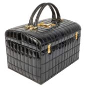 A vanity box in a black patent moc-croc leather with lock mechanism. L. 30xm x H. 21, D. 21cm.