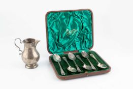An early George III silver baluster cream jug, with scroll handle, maker's mark TC probably Thomas