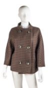 A Max Mara, Italy, short winter coat in a geometric pattern and in colours of black and brown.