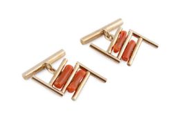 A pair of coral set cufflinks, of geometric design, with chain-link and baton fittings, panel length