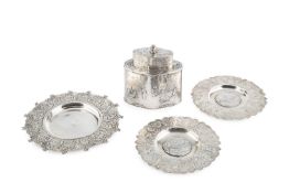 A late 19th century Dutch silver tea caddy, of shaped outline, the sides and cover embossed with