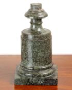 A serpentine marble stand