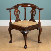 A George III mahogany corner chair