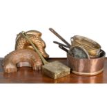 A collection of copper and brass kitchenware
