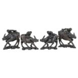 Two pairs of Chinese carved ornaments