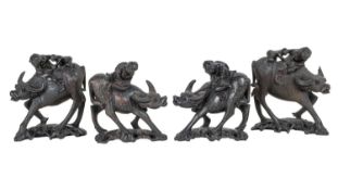 Two pairs of Chinese carved ornaments