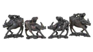 Two pairs of Chinese carved ornaments